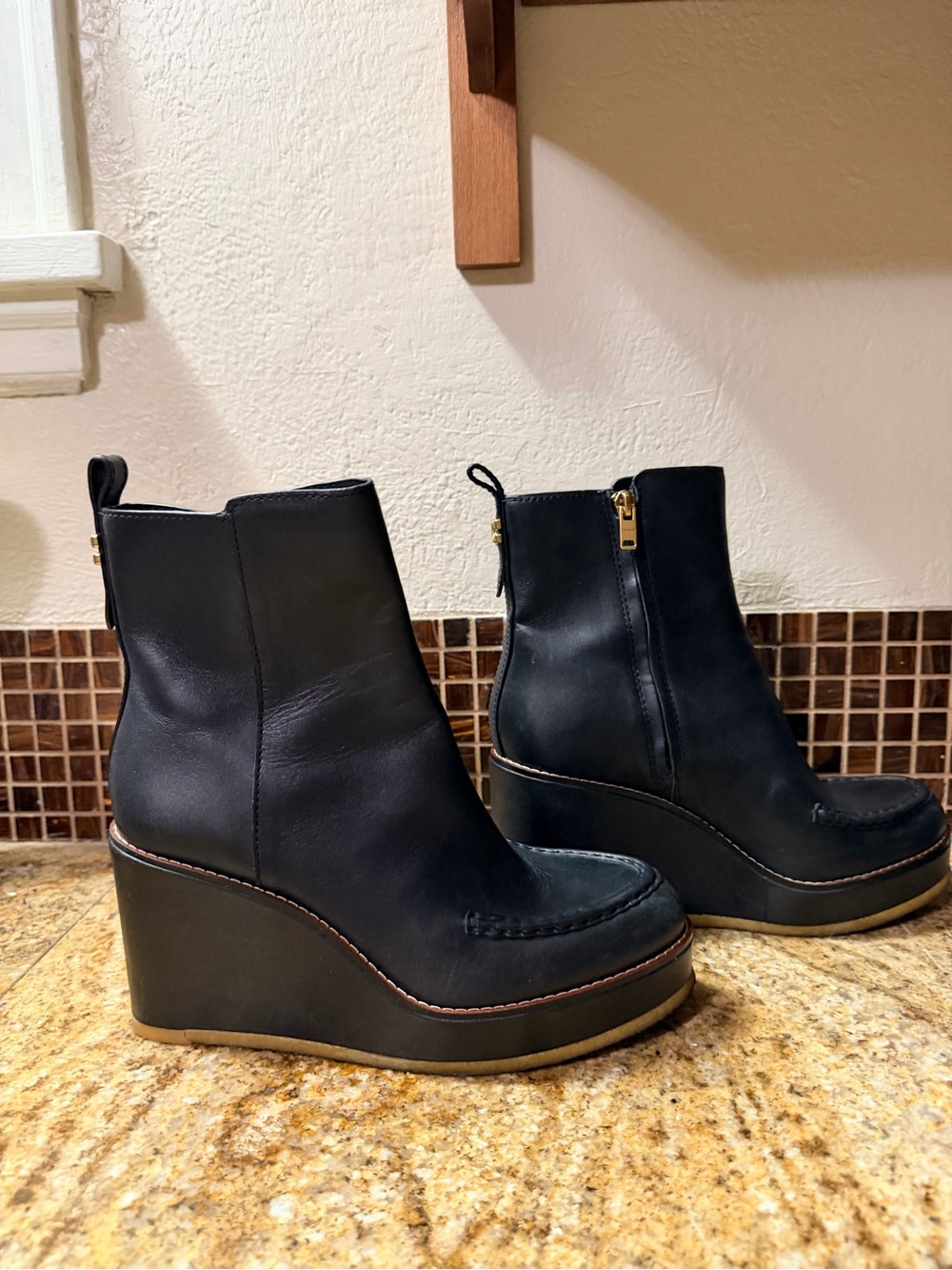 Coach Black Wedge Ankle Boots with Gold Zipper Accents